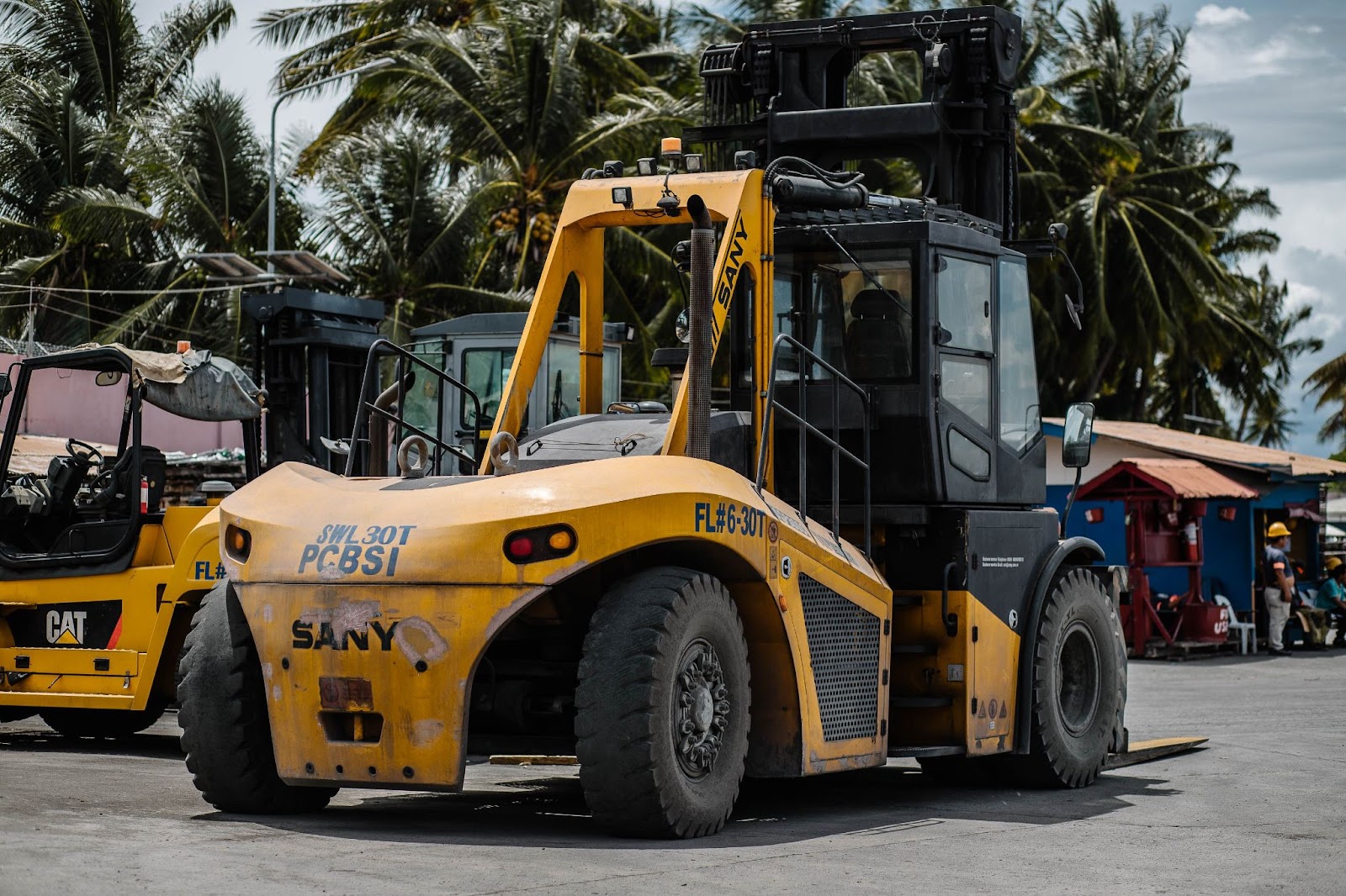 A class-VII rugged, large-scale yellow forklift