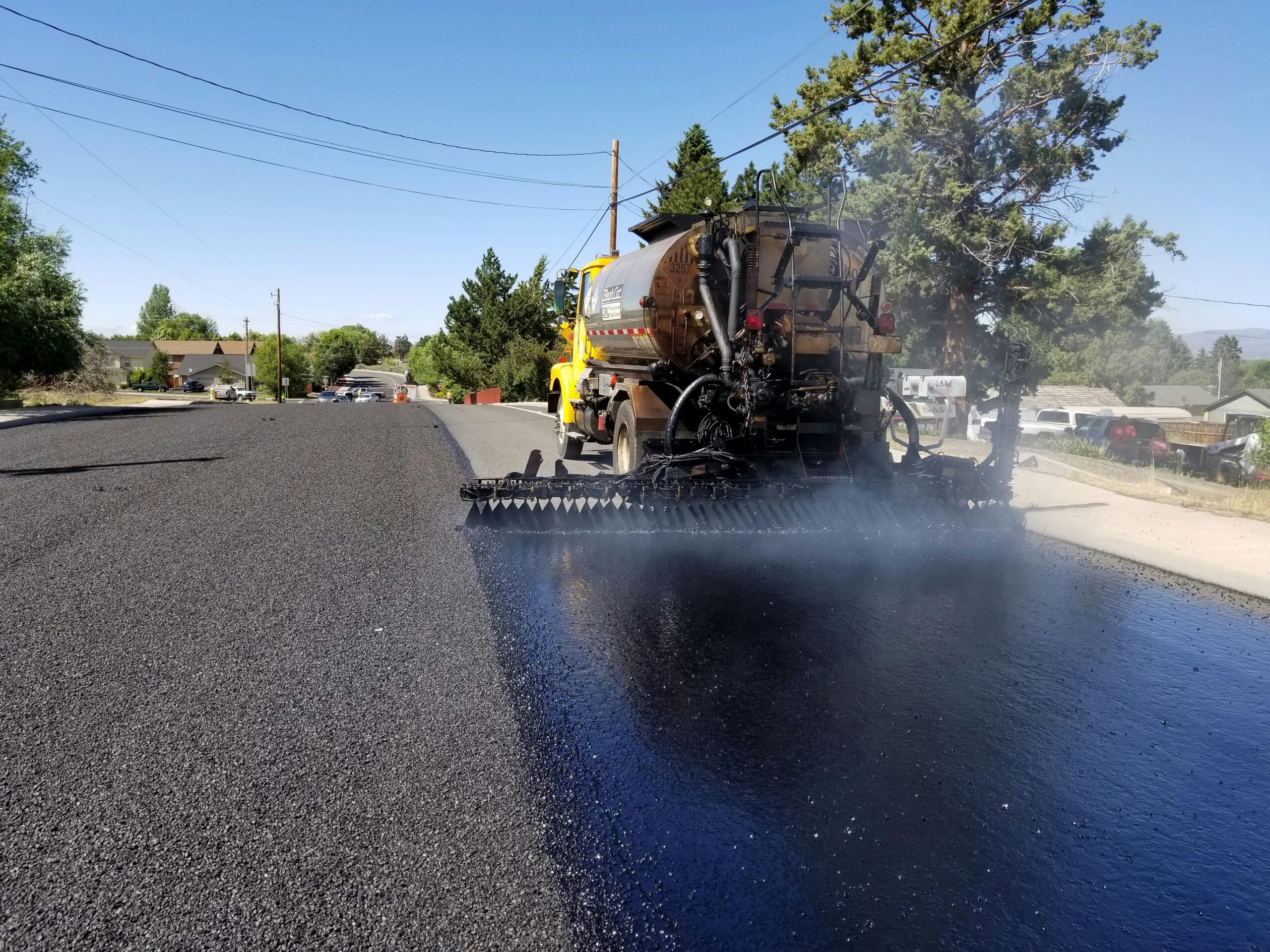 An asphalt paver in action